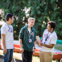 Your Dream Job Image of three young camp staff talking and laughing