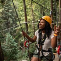 Defining Moments - Photo of camper on ropes course